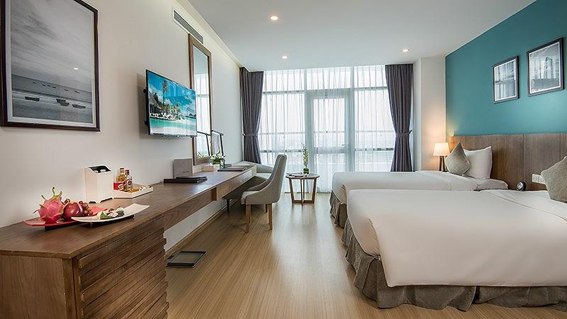 Những khách sạn 4 sao Đà Nẵng có đánh giá tốt 7 - Phòng ngủ với thiết kế trang nhã, ấm cúng.