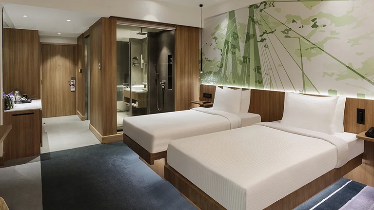 Bố trí phòng với 2 giường đơn phù hợp với nhu cầu nghỉ ngơi